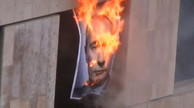 Putin's face burns in the new Pussy Riot video